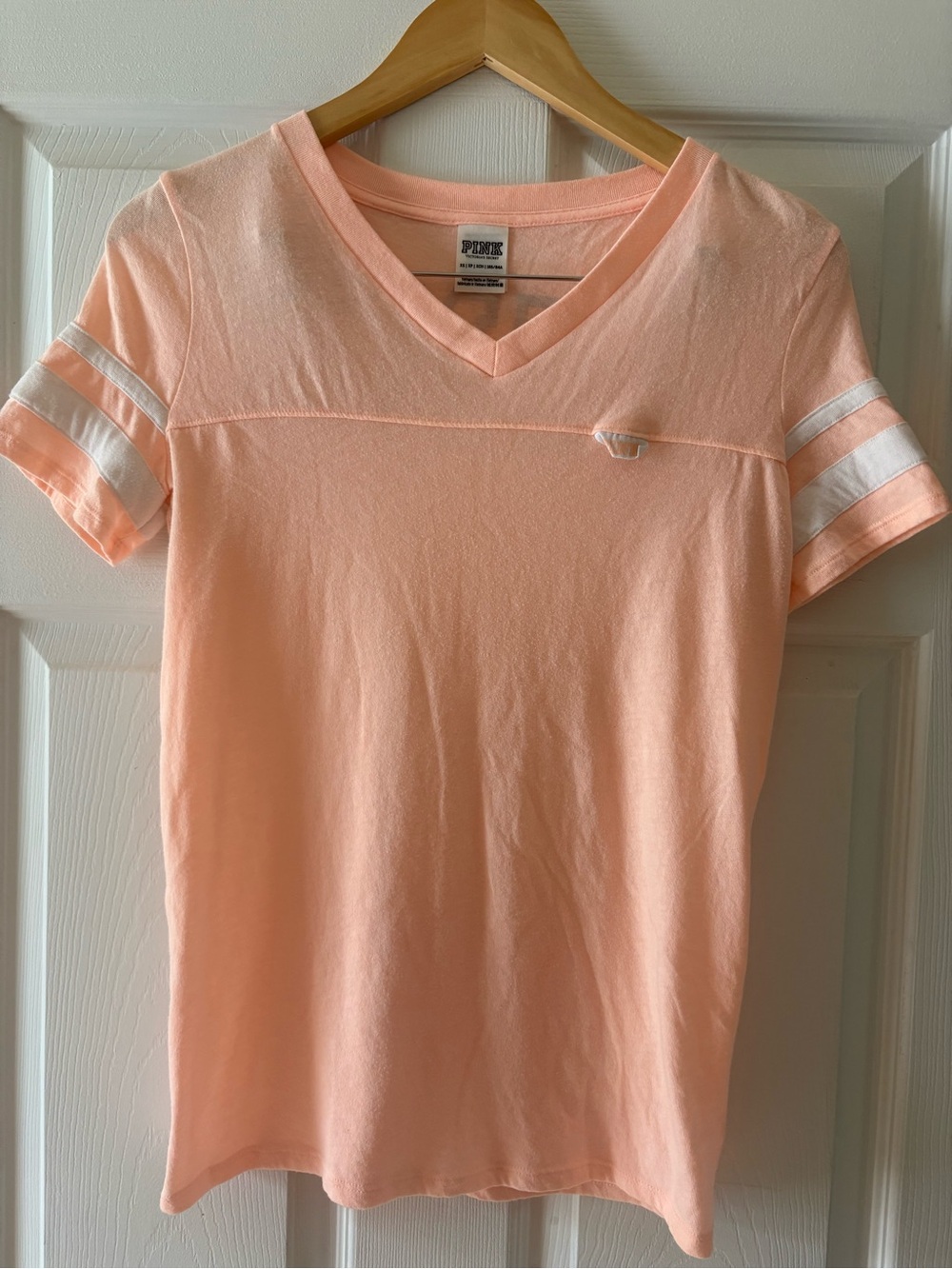 PINK Victoria's Secret Light Peach V-Neck Tee with White Sleeve Stripes